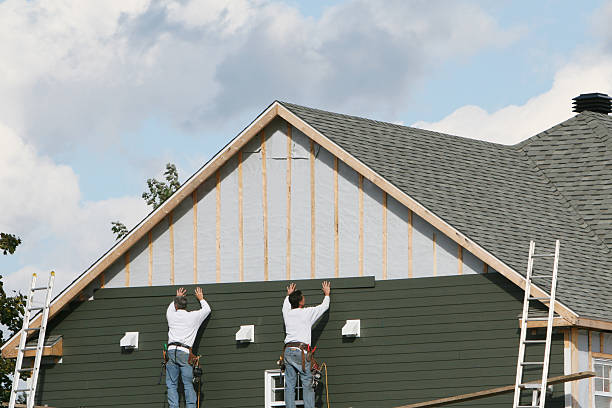Professional Emergency Siding Repair technician working in Oakboro, NC